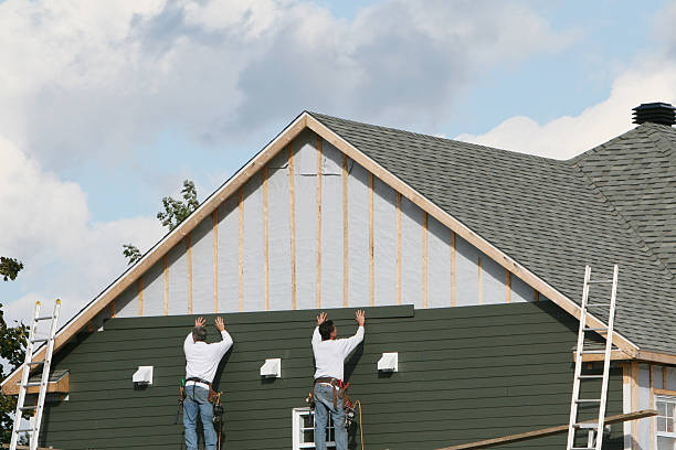 Professional Siding Replacement technician working in Austinburg, OH